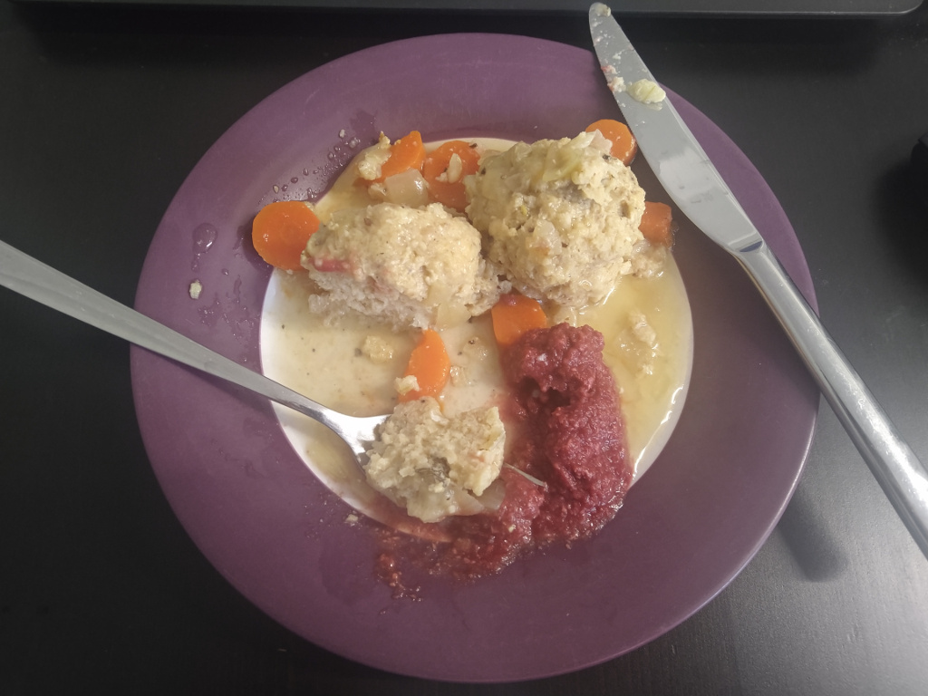 A plate of gefilte fish, with chrayne, in action