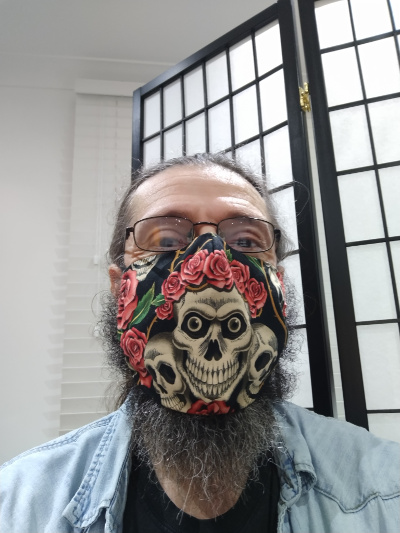 Image of Wayne wearing a mask